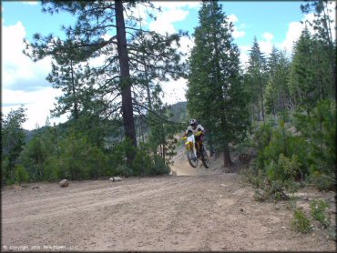 OHV getting air at Chappie-Shasta OHV Area Trail