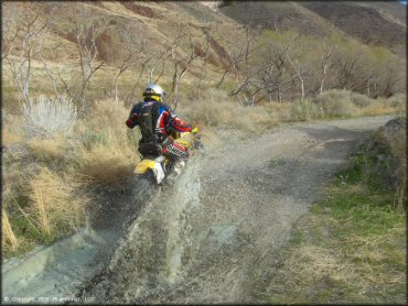 OHV crossing some water at Panaca Trails OHV Area