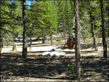 Female rider on a Honda All Terrain Vehicle at South Camp Peak Loop Trail