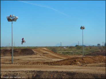 Honda CRF Dirt Bike catching some air at Motogrande MX Track