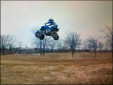 Yamaha Raptor with rider in the air.