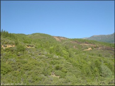 Scenic view of surrounding hills and forests.