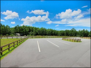 Paved parking lot for trucks and trailers with OHVs.