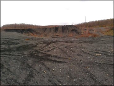 Large mound of coal and gravel.