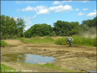 Motorcycle floating the front at Connecticut River MX Track