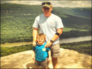 Father and son overlooking Tennessee River.