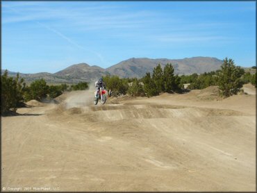 Honda CRF Motorcycle jumping at Stead MX OHV Area