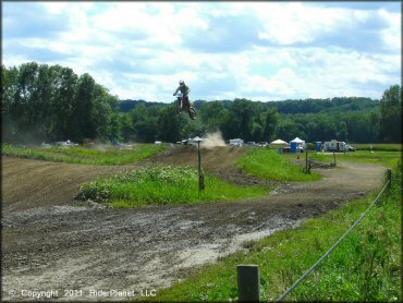 Motorcycle jumping at Connecticut River MX Track