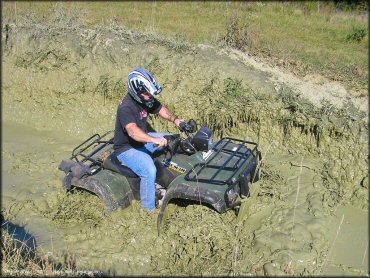 Honda OHV getting wet at Big Rock Off Road Park Trail
