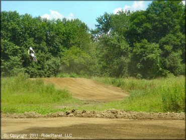 Yamaha YZ Motorcycle jumping at Connecticut River MX Track