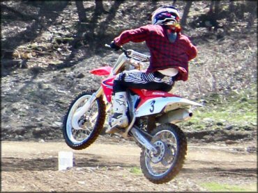 OHV catching some air at Echo Valley Farm Motocross Track