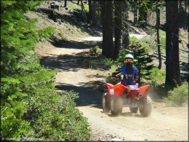 Girl on a Honda Quad at South Camp Peak Loop Trail