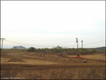 Dirtbike catching some air at Canyon Motocross OHV Area