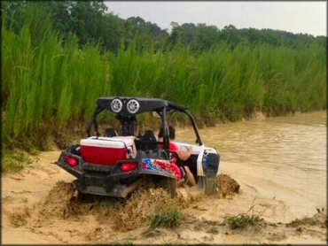 OHV crossing some water at Burden's Creek ATV Park Trail
