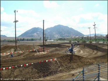 Yamaha YZ Dirt Bike jumping at State Fair MX Track