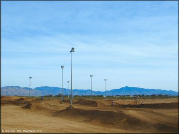 Motorbike getting air at M.C. Motorsports Park Track