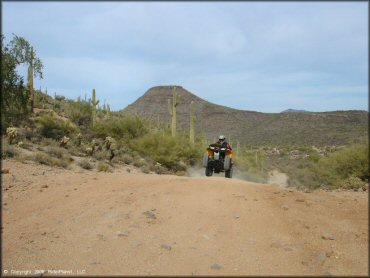 OHV doing a wheelie at Four Peaks Trail