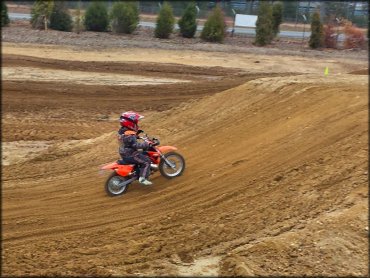 Young boy on KTM 50cc.