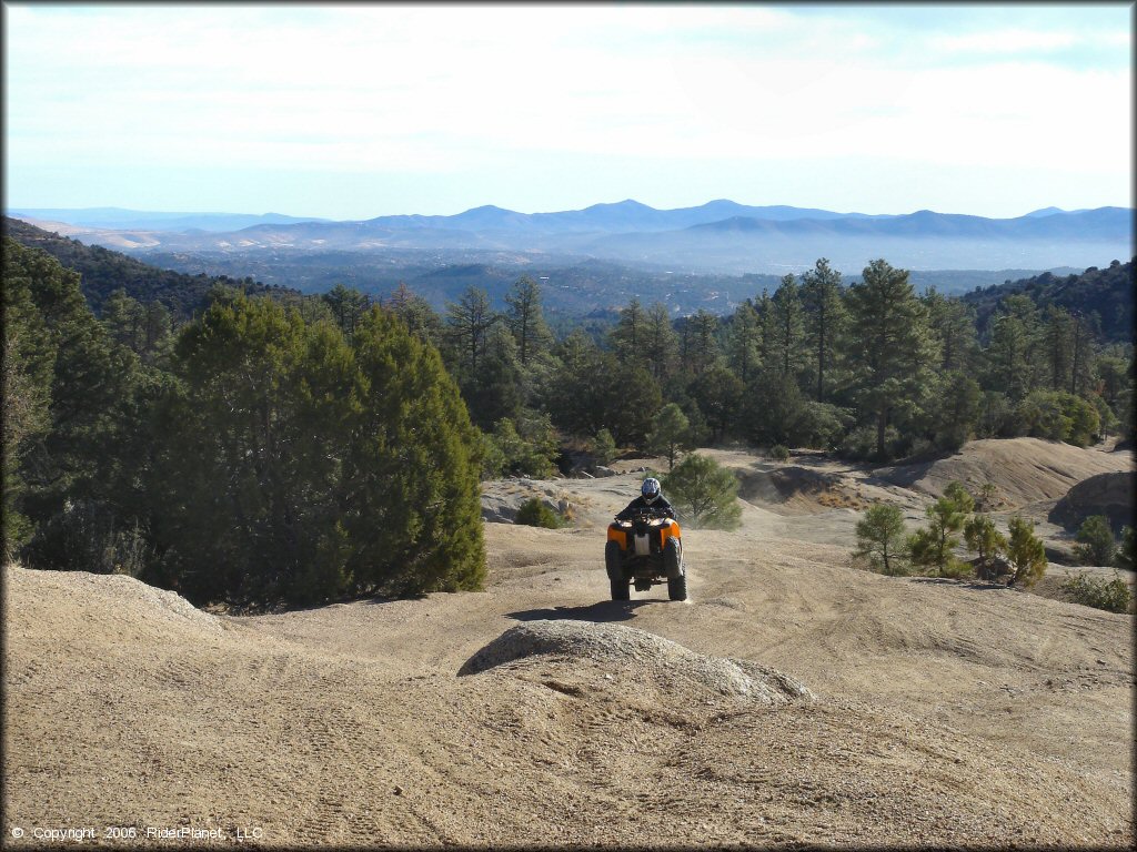 OHV popping a wheelie at Alto Pit OHV Area Trail