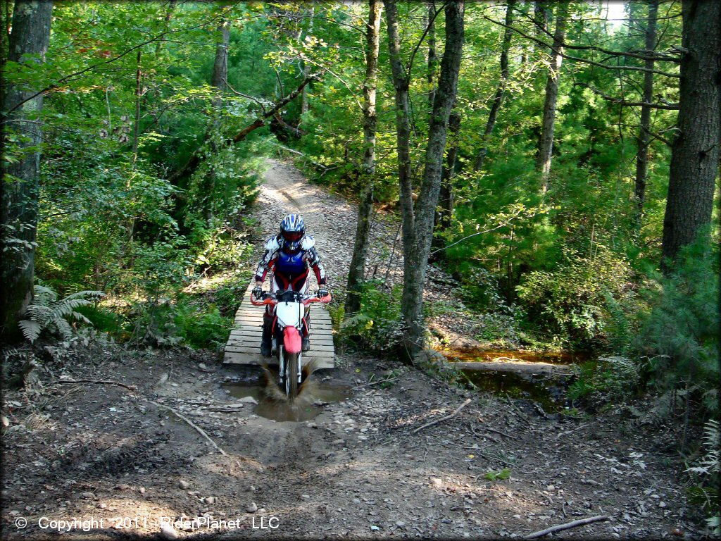 OHV crossing some water at Freetown-Fall River State Forest Trail