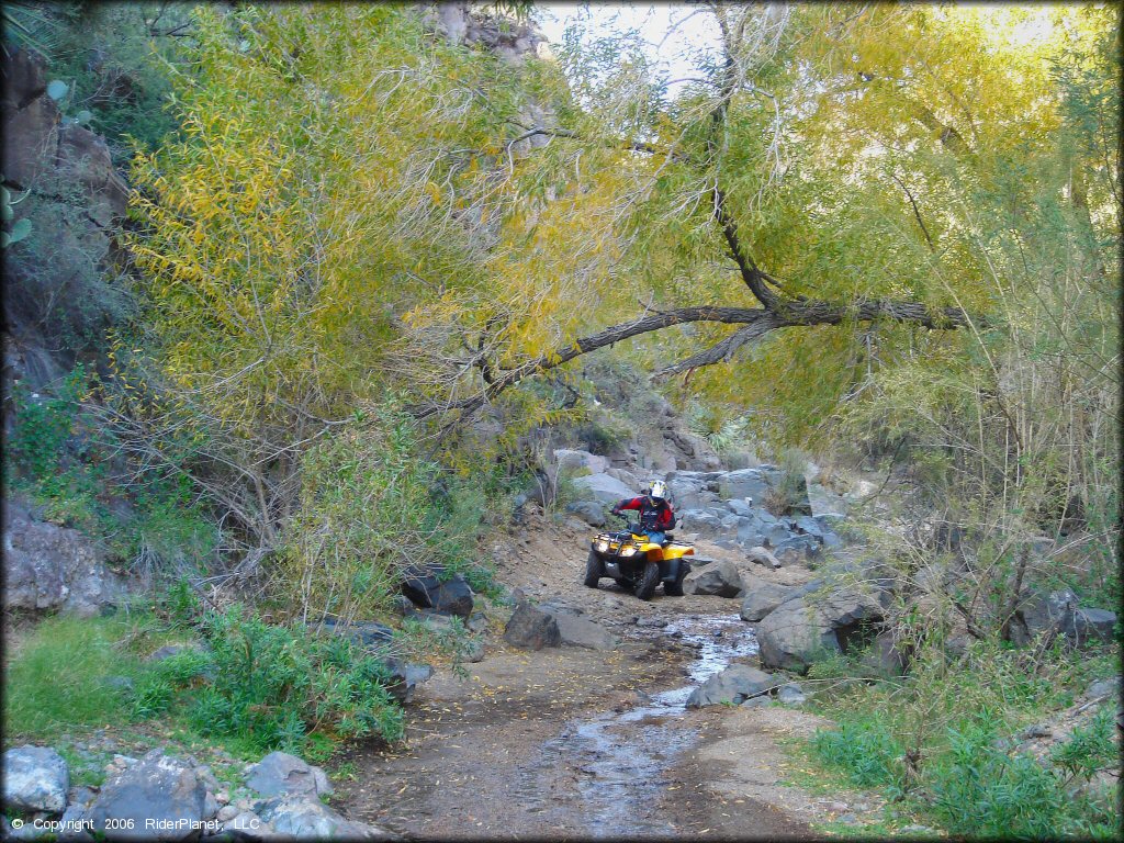 OHV traversing the water at Log Corral Canyon Trail