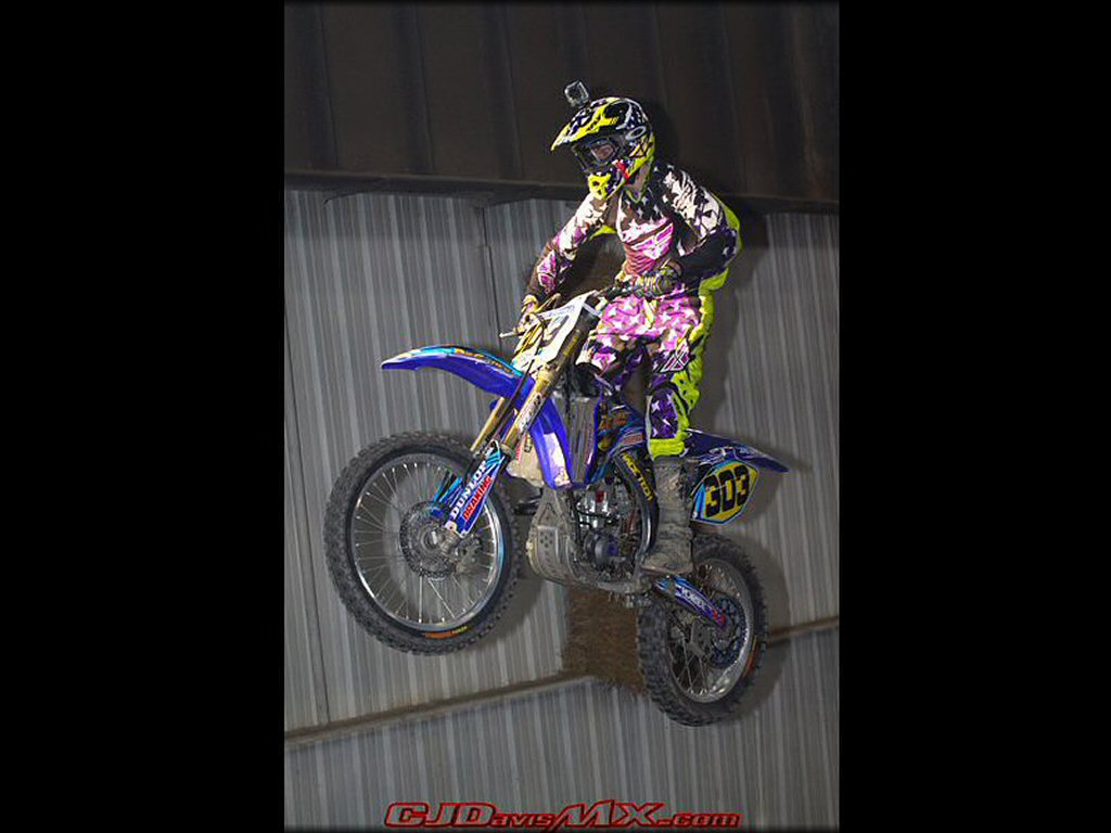 Yamaha YZ Dirt Bike jumping at Circle T Arenacross Track