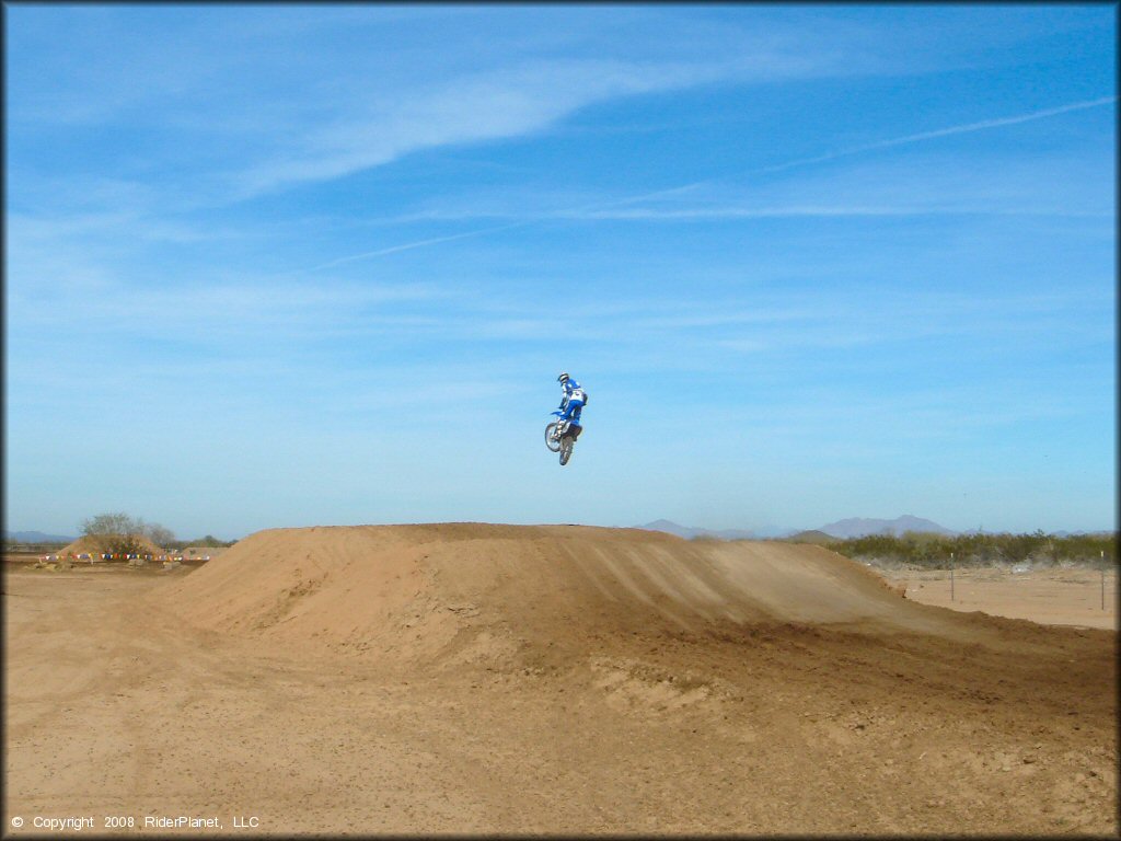 Yamaha YZ Motorcycle getting air at Motoland MX Park Track