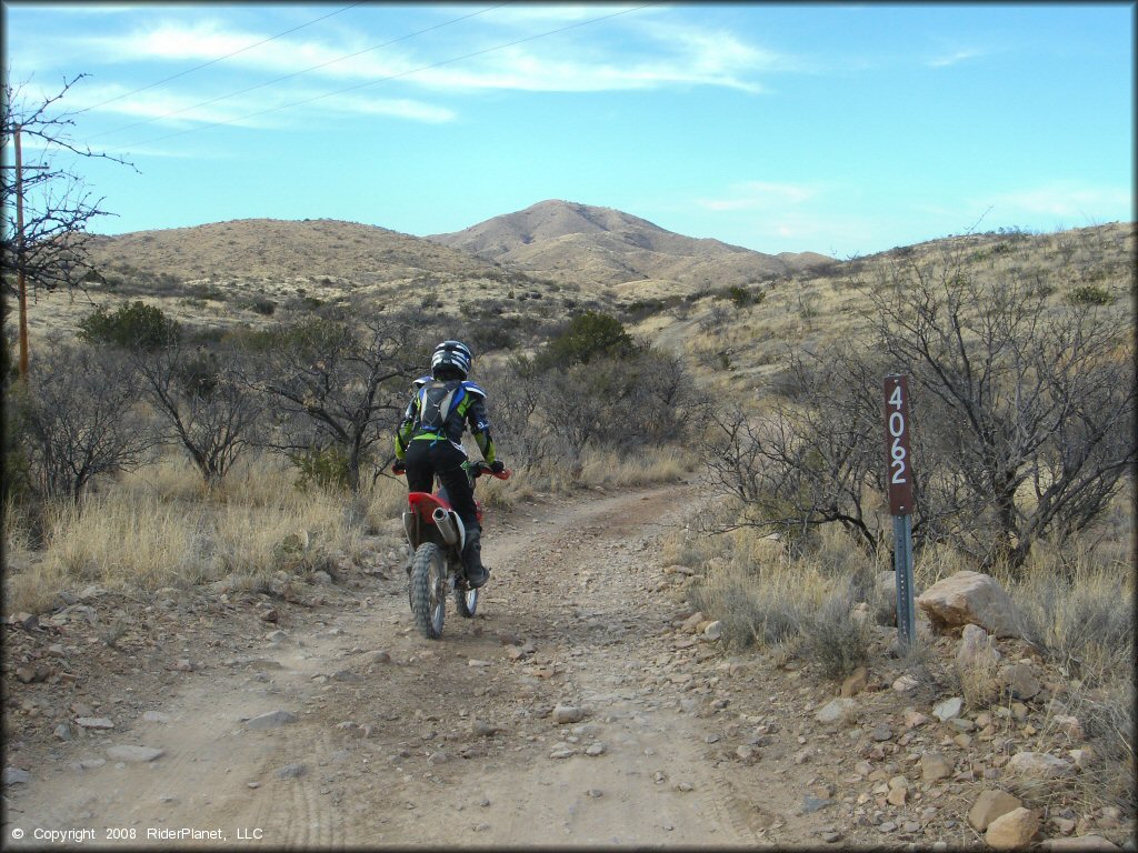 Girl on a Honda CRF Dirt Bike at Santa Rita OHV Routes Trail