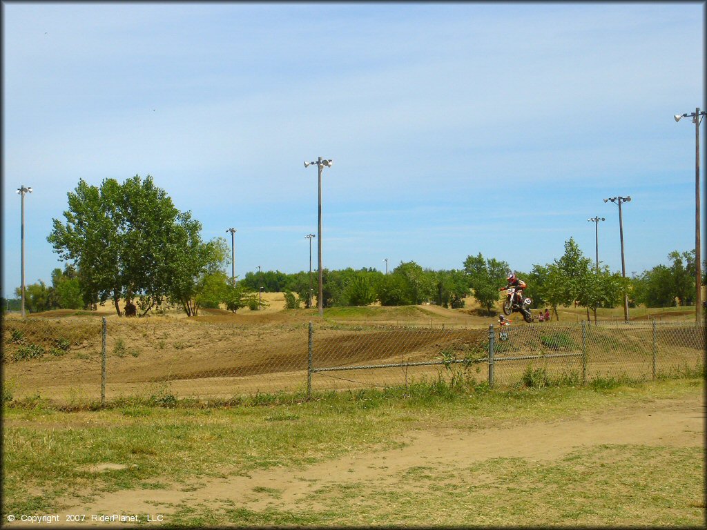 Honda CRF Motorcycle jumping at Riverfront MX Park Track