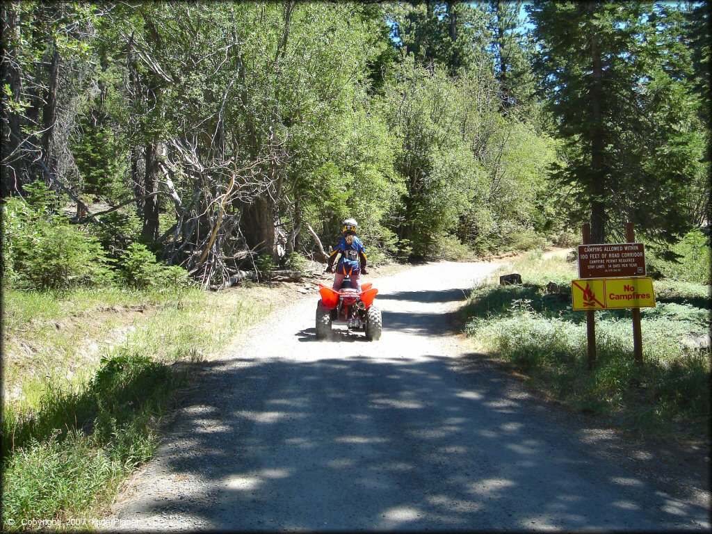 Girl riding a Honda ATV at South Camp Peak Loop Trail