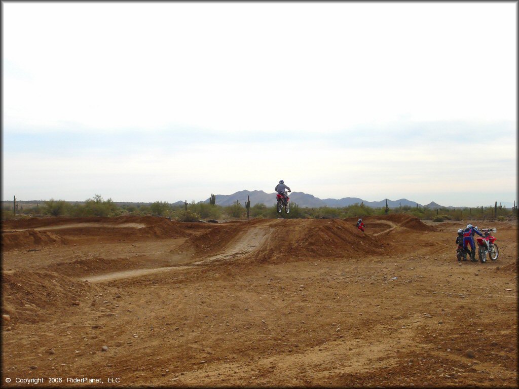 Honda CRF Motorcycle jumping at Canyon Motocross OHV Area