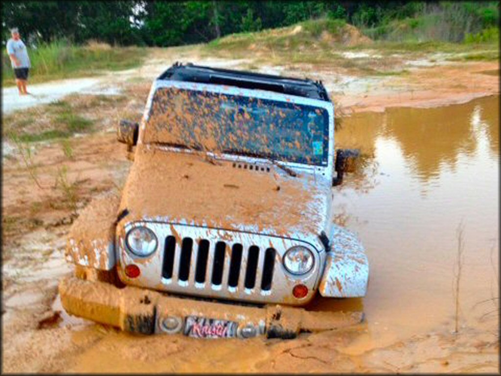 4x4 crossing some water at Catahoula Recreation Club Trail