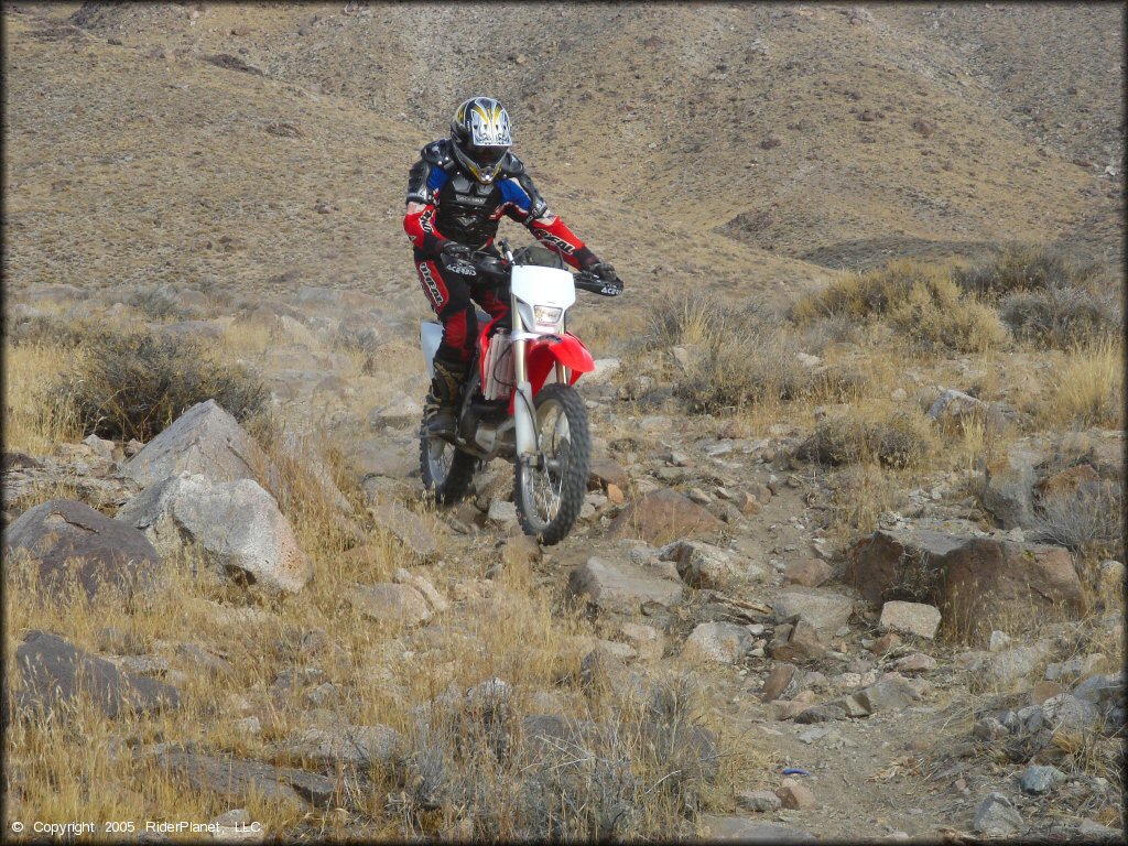 Honda CRF Motorcycle doing a wheelie at Wilson Canyon Trail