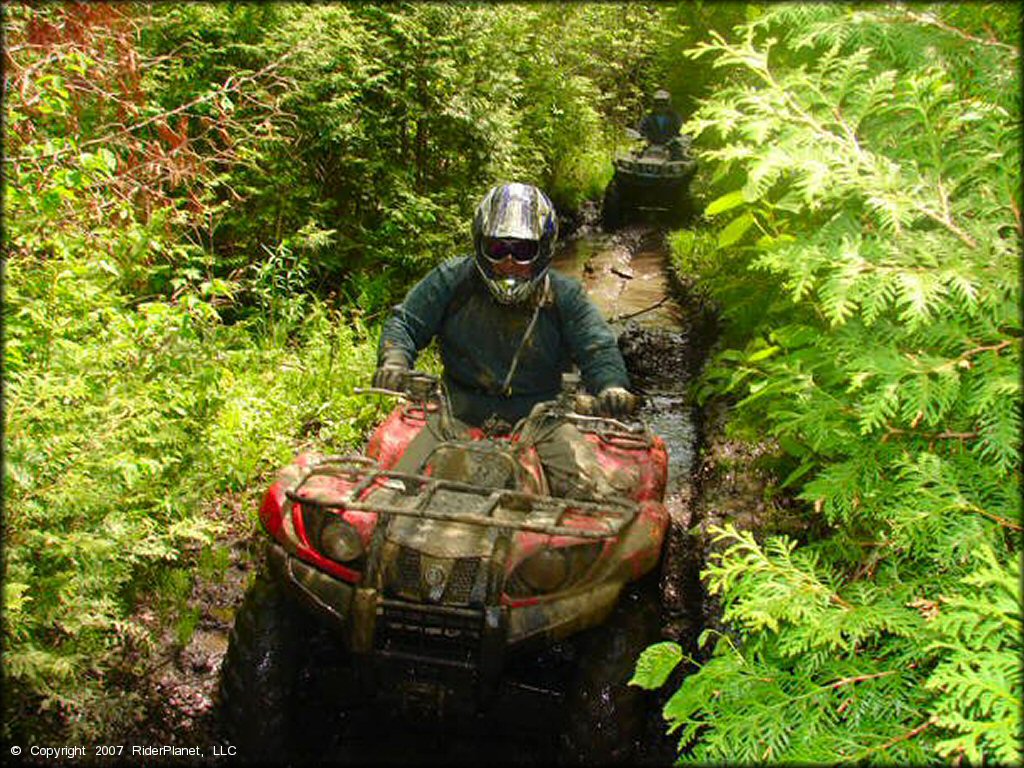 OHV in the water at Katahdin Lodge Trail