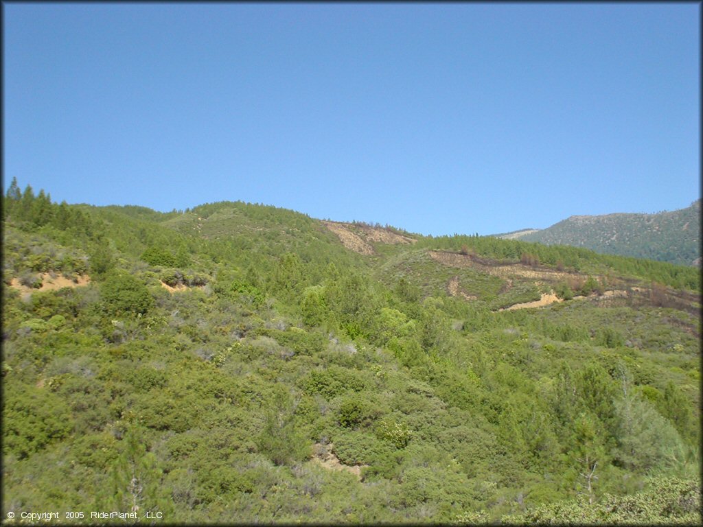 Scenic view of surrounding hills and forests.