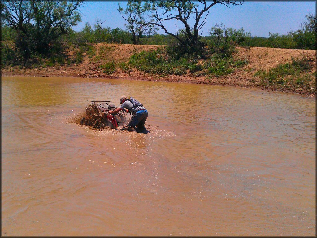 OHV crossing the water at Mudualistic ATV Park OHV Area
