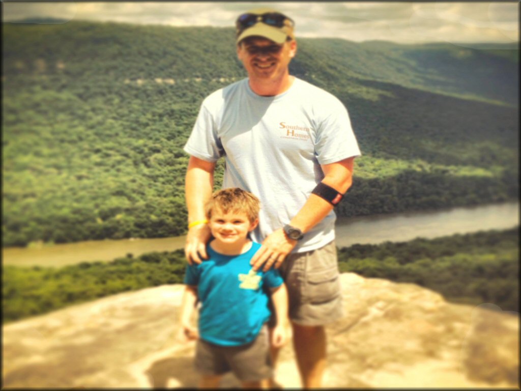 Father and son overlooking Tennessee River.