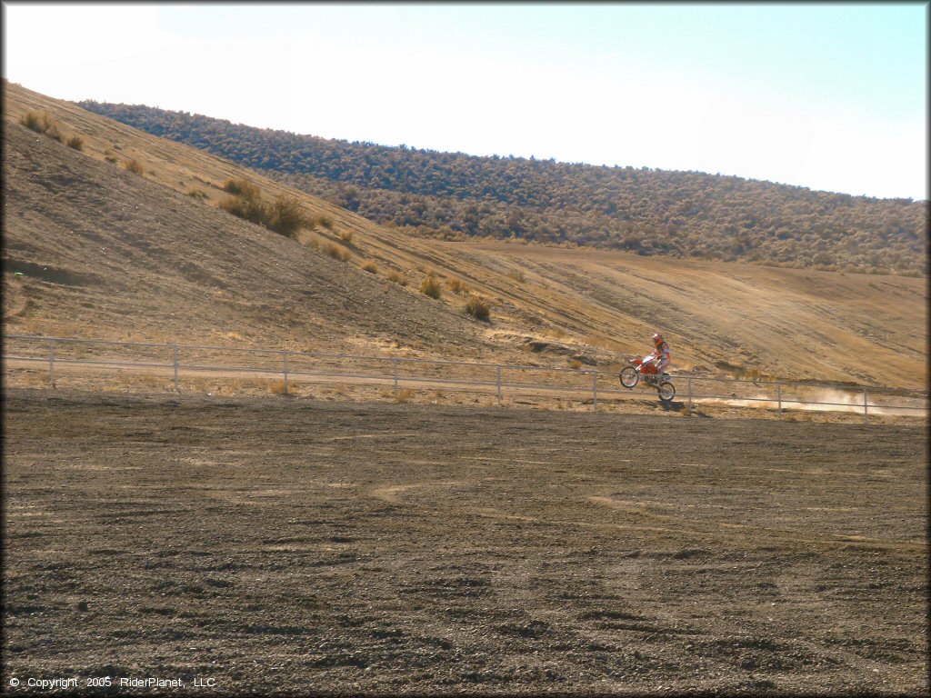 Honda CRF Dirt Bike wheelying at Washoe Valley Jumbo Grade OHV Area