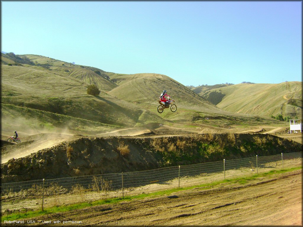 Honda CRF Motorcycle jumping at Carnegie SVRA OHV Area