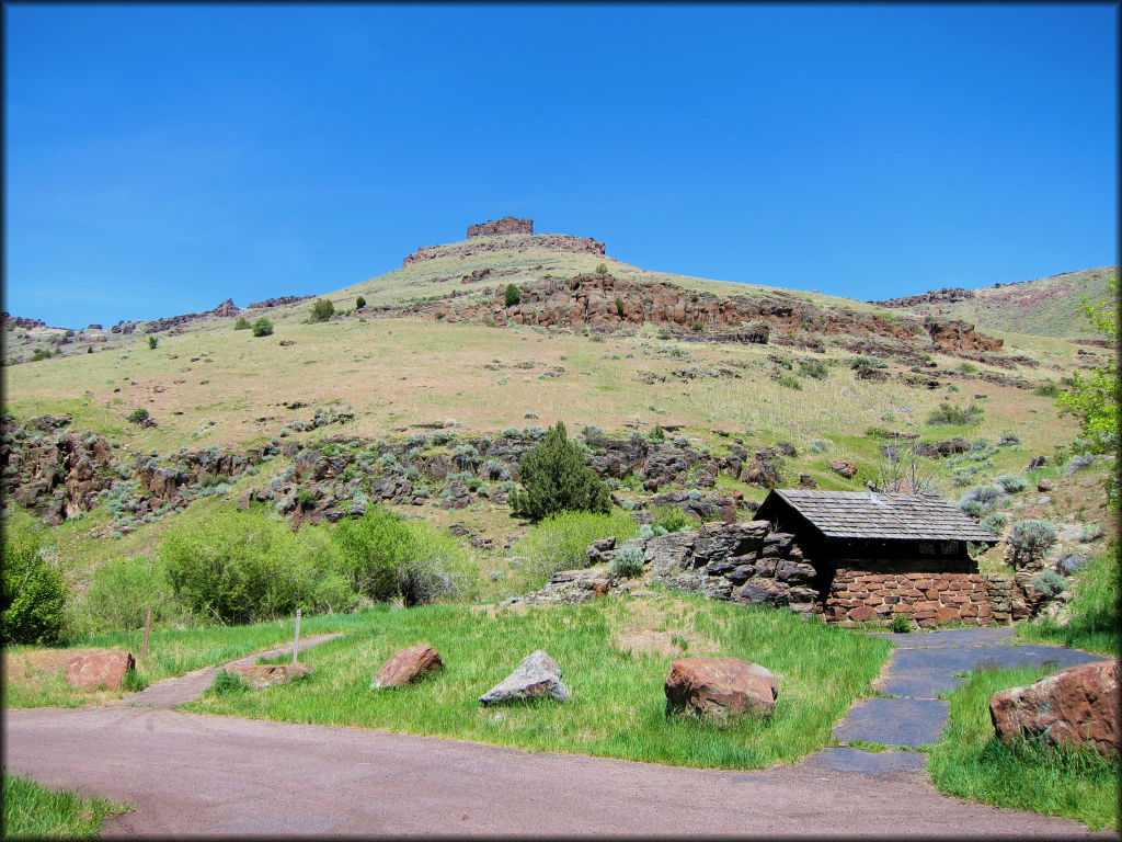 View of Harrington Fork Staging Area with restroom in the background.