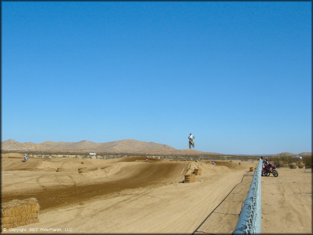 Motorcycle jumping at Cal City MX Park OHV Area