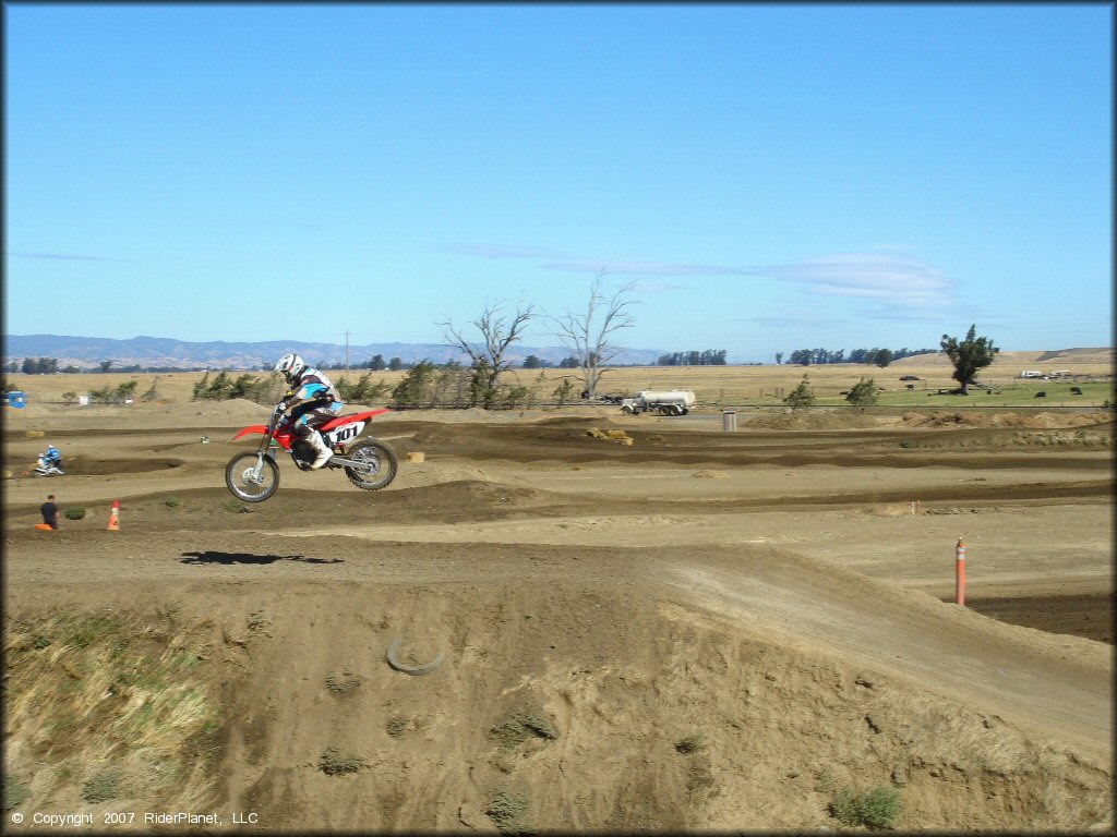 Honda CRF Motorcycle jumping at Argyll MX Park Track
