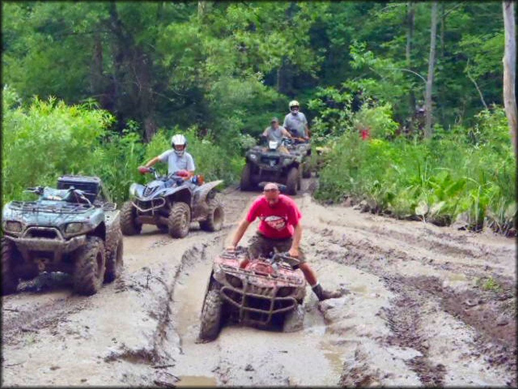 OHV in the water at Hopedale Sportsman's Club ATV Rally Trail