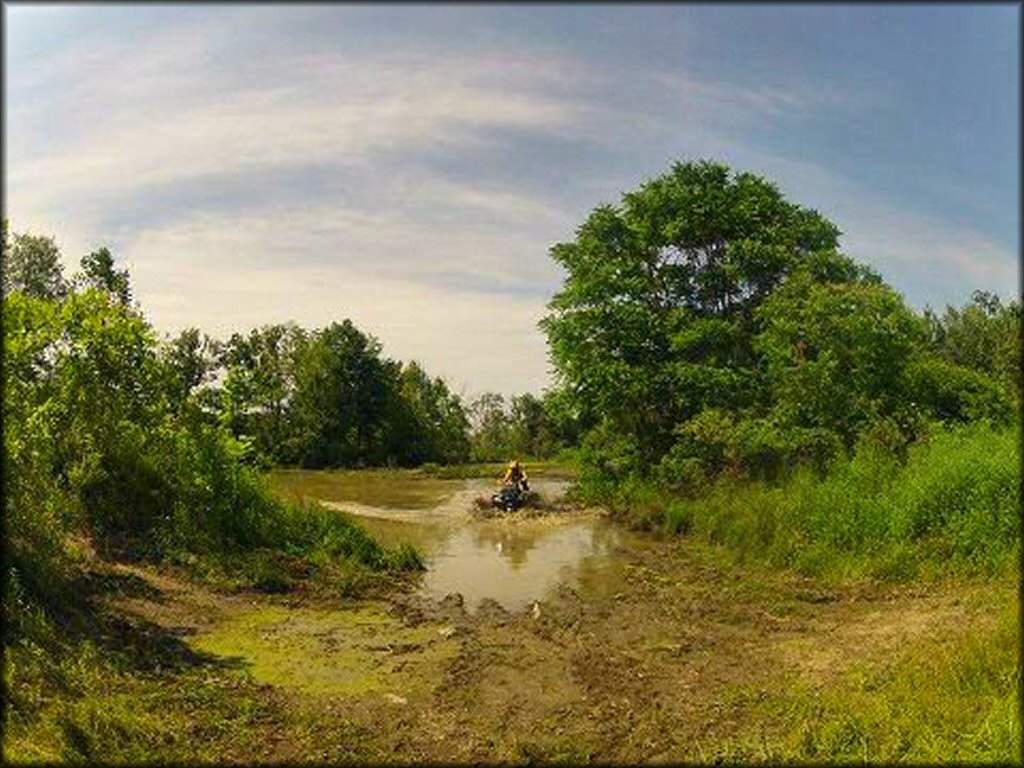 OHV traversing the water at Hudson Valley Trails