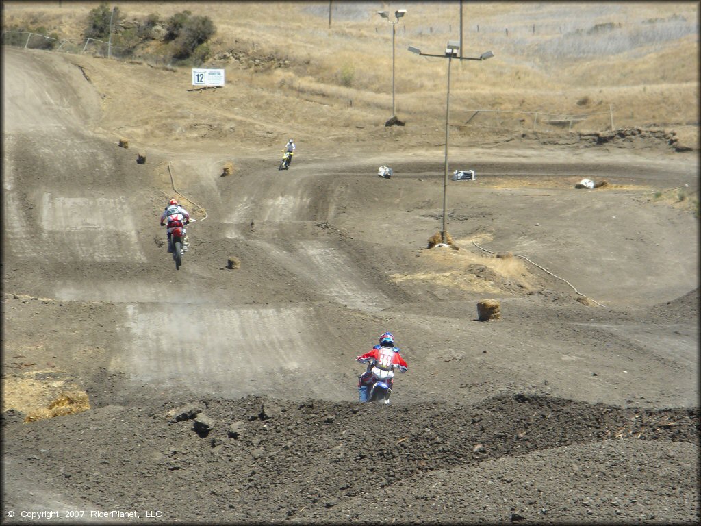 Honda CRF Motorcycle jumping at Club Moto Track