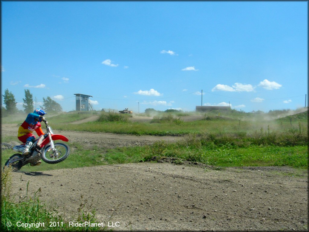 Honda CRF Dirt Bike jumping at Frozen Ocean Motorsports Complex Track