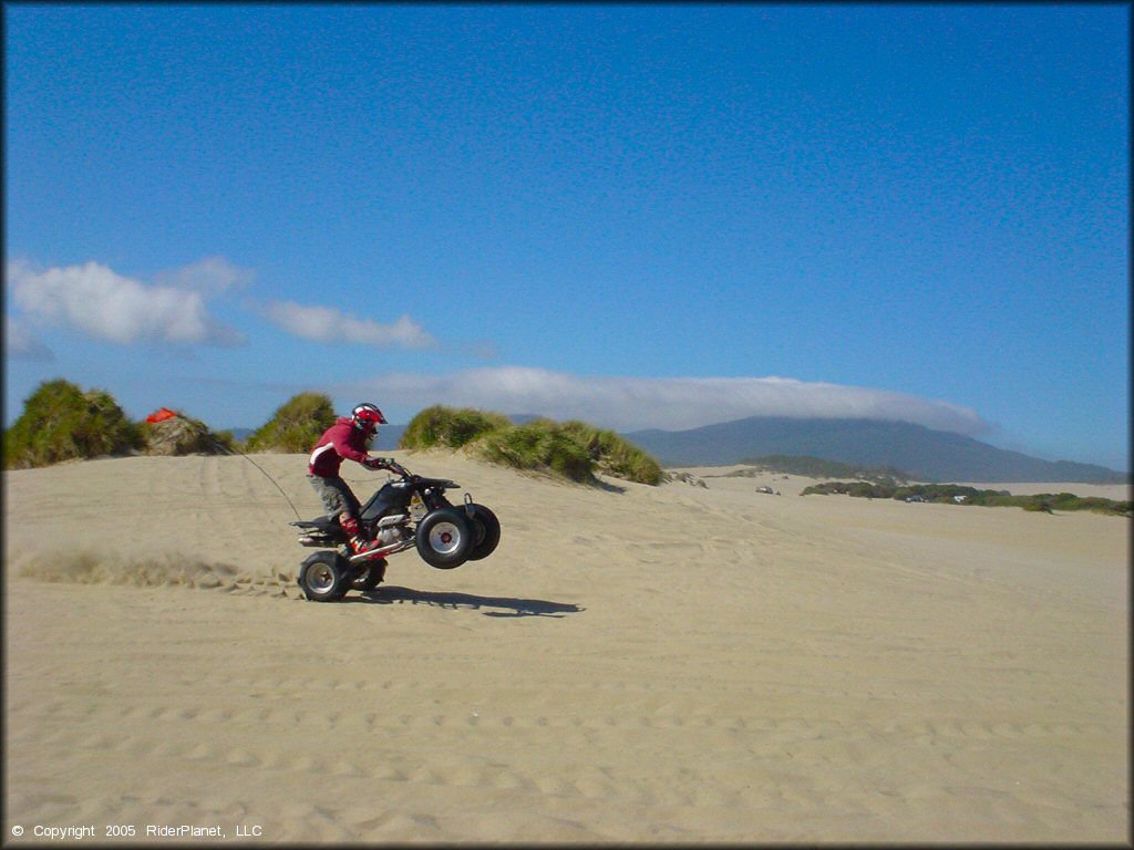 OHV doing a wheelie at Sand Lake Dune Area