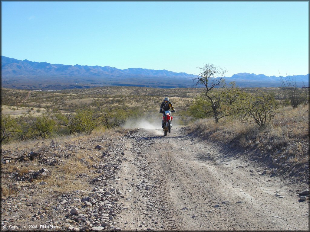 Honda CRF Motorcycle wheelying at Red Springs Trail