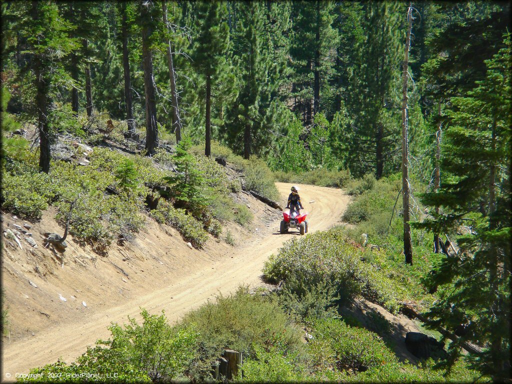 Girl riding a Honda ATV at South Camp Peak Loop Trail