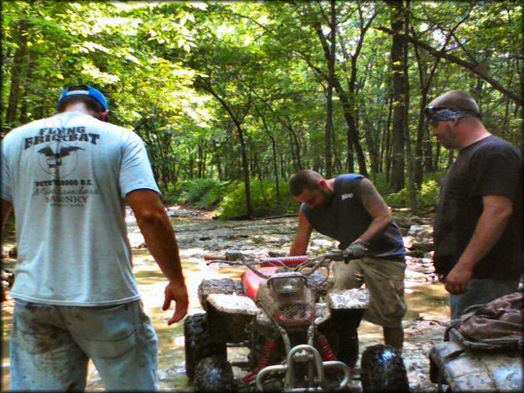 OHV in the water at GooseHoller ATV Park Trail